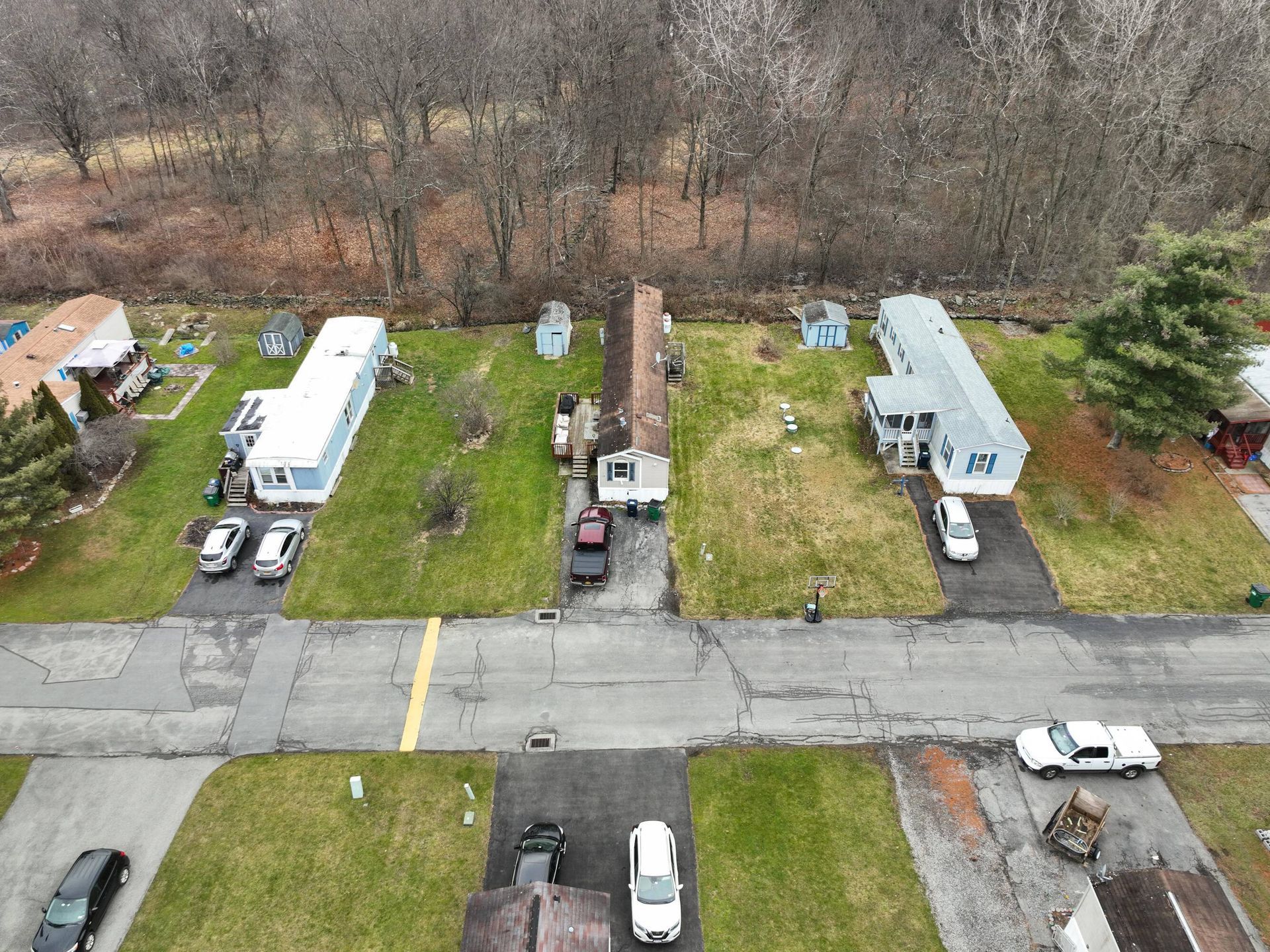 An aerial view of a mobile home park in a residential area