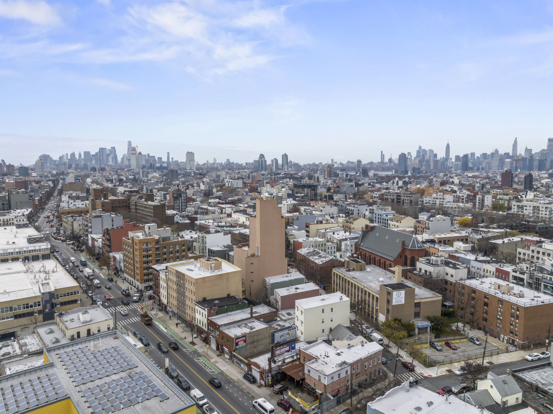 An aerial view of a city with a lot of buildings