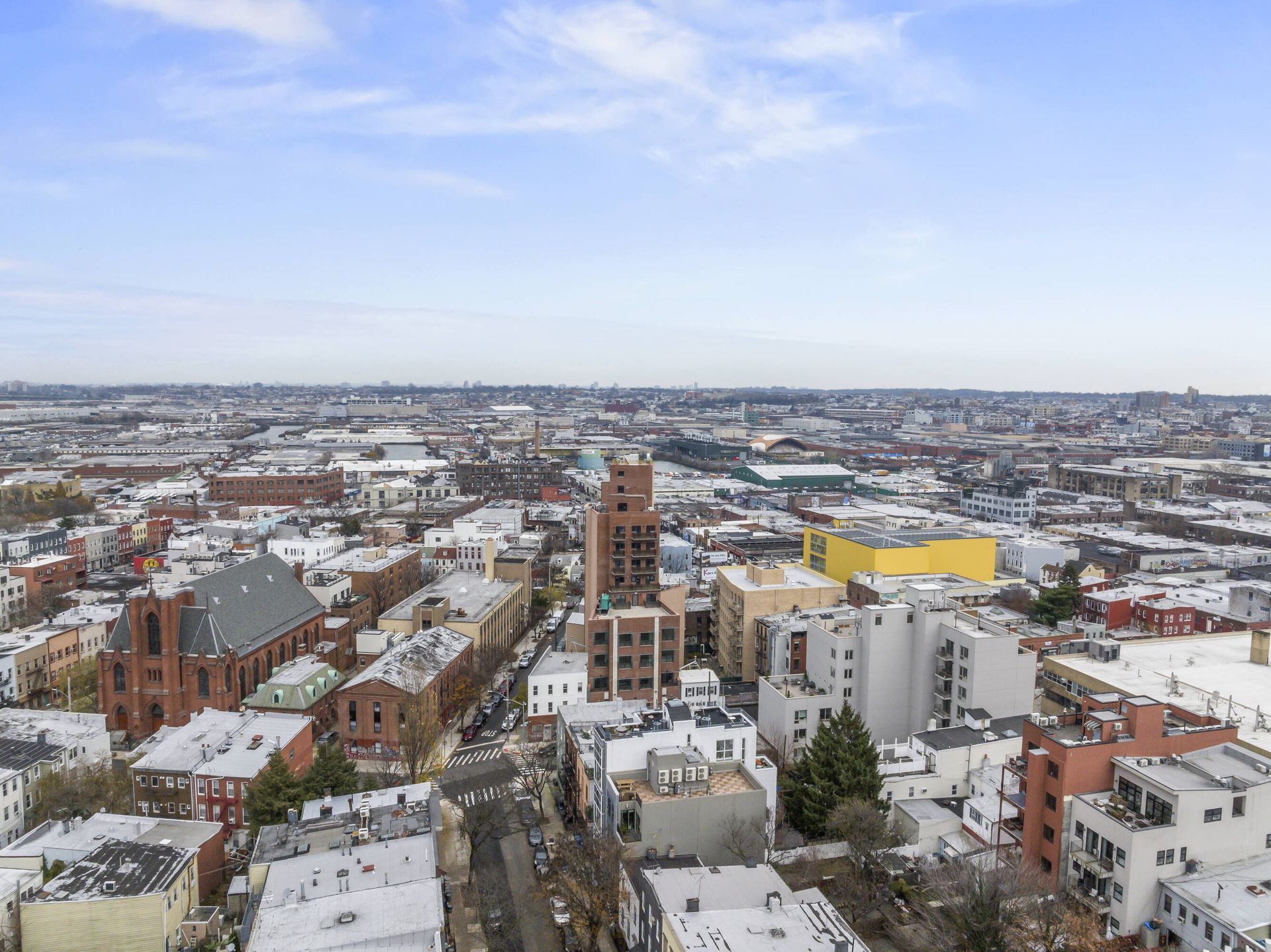 An aerial view of a city with a lot of buildings