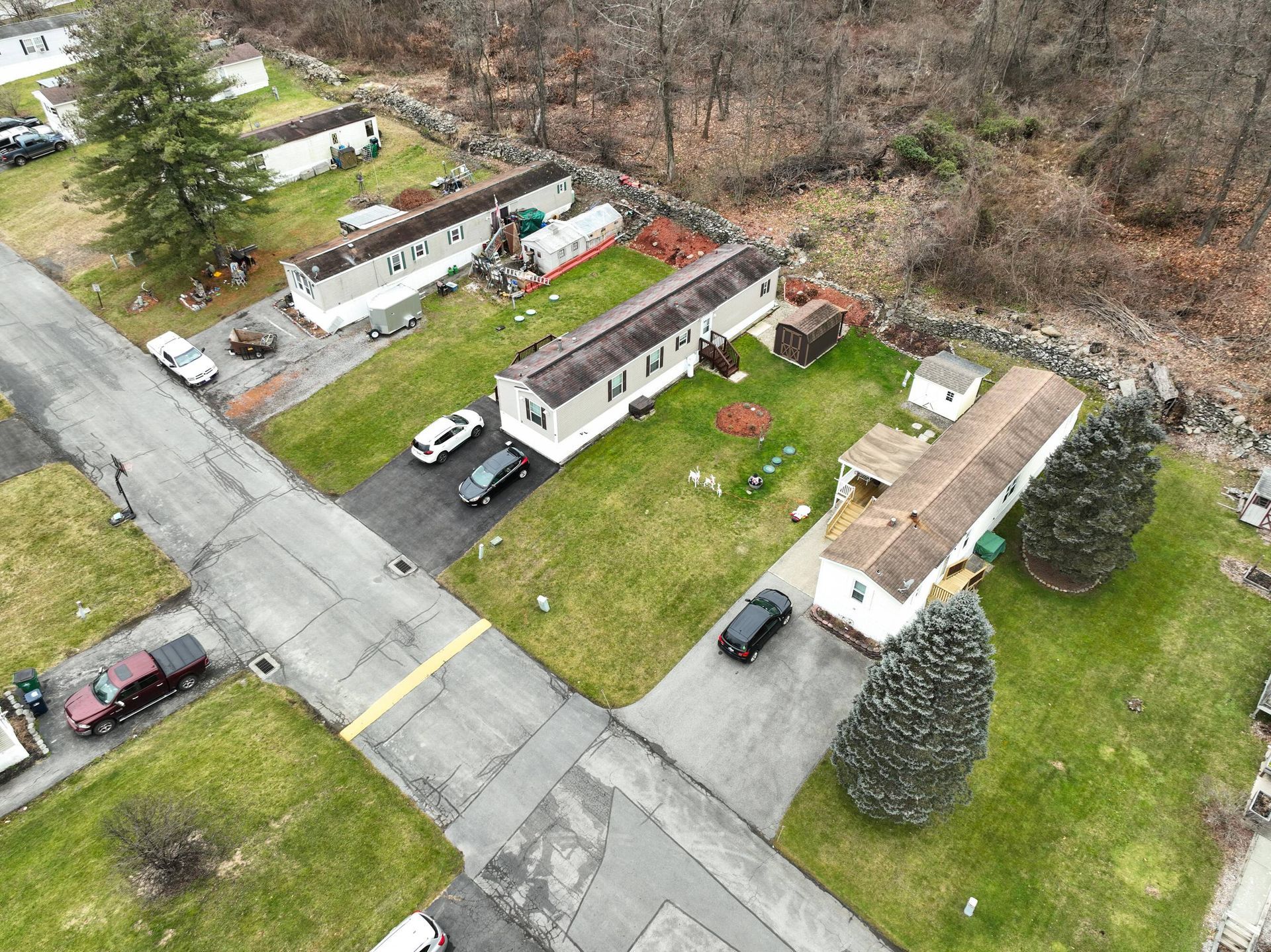 An aerial view of a mobile home park with a lot of houses.