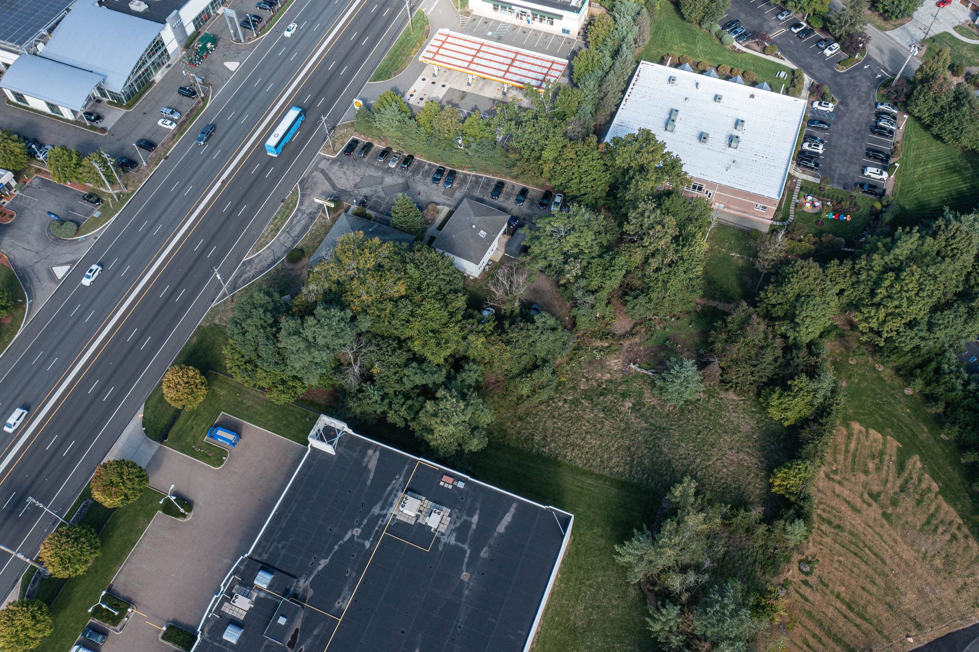 An aerial view of a city with a lot of buildings and trees.