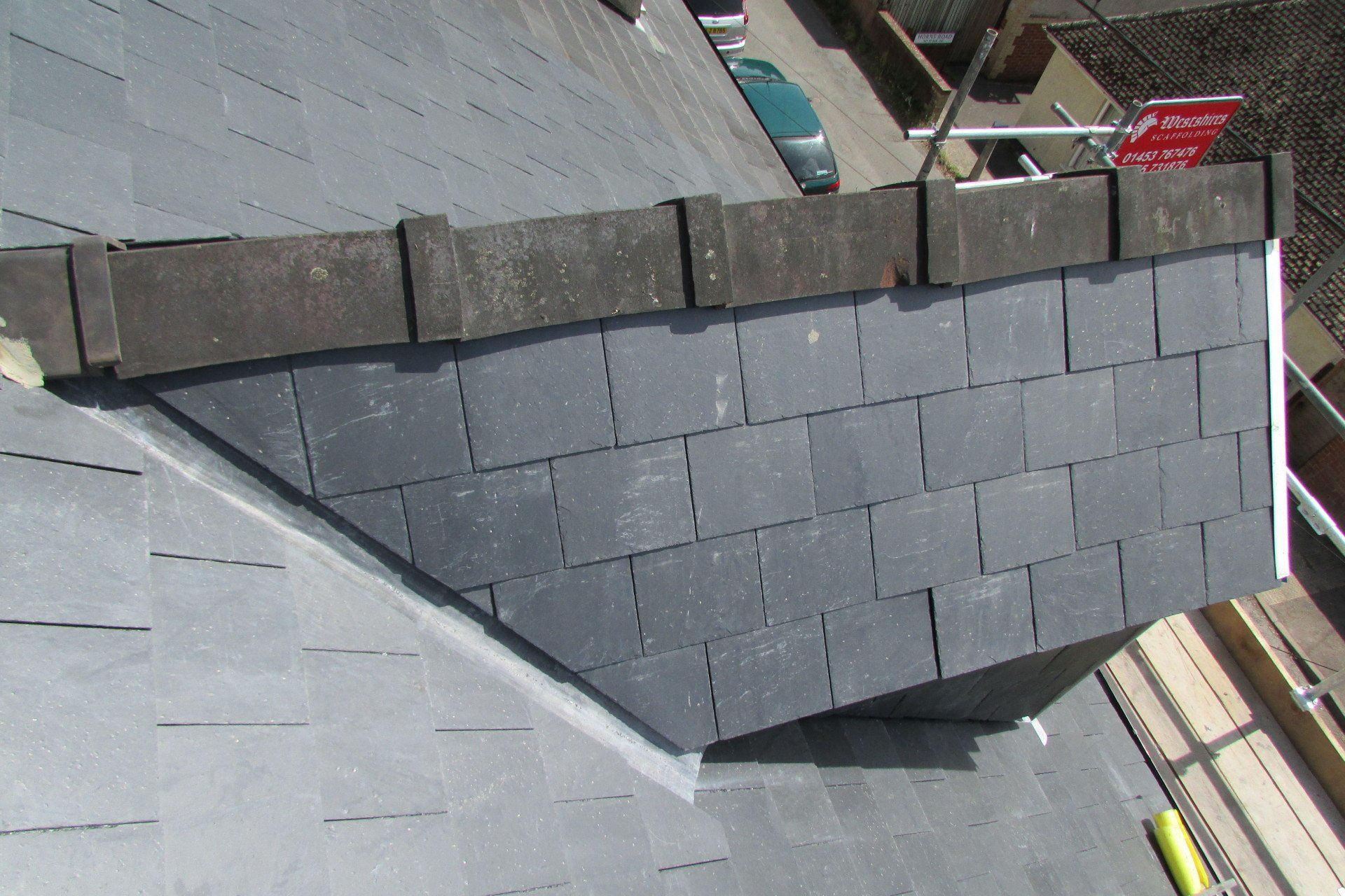 A roof with a lot of slate tiles on it