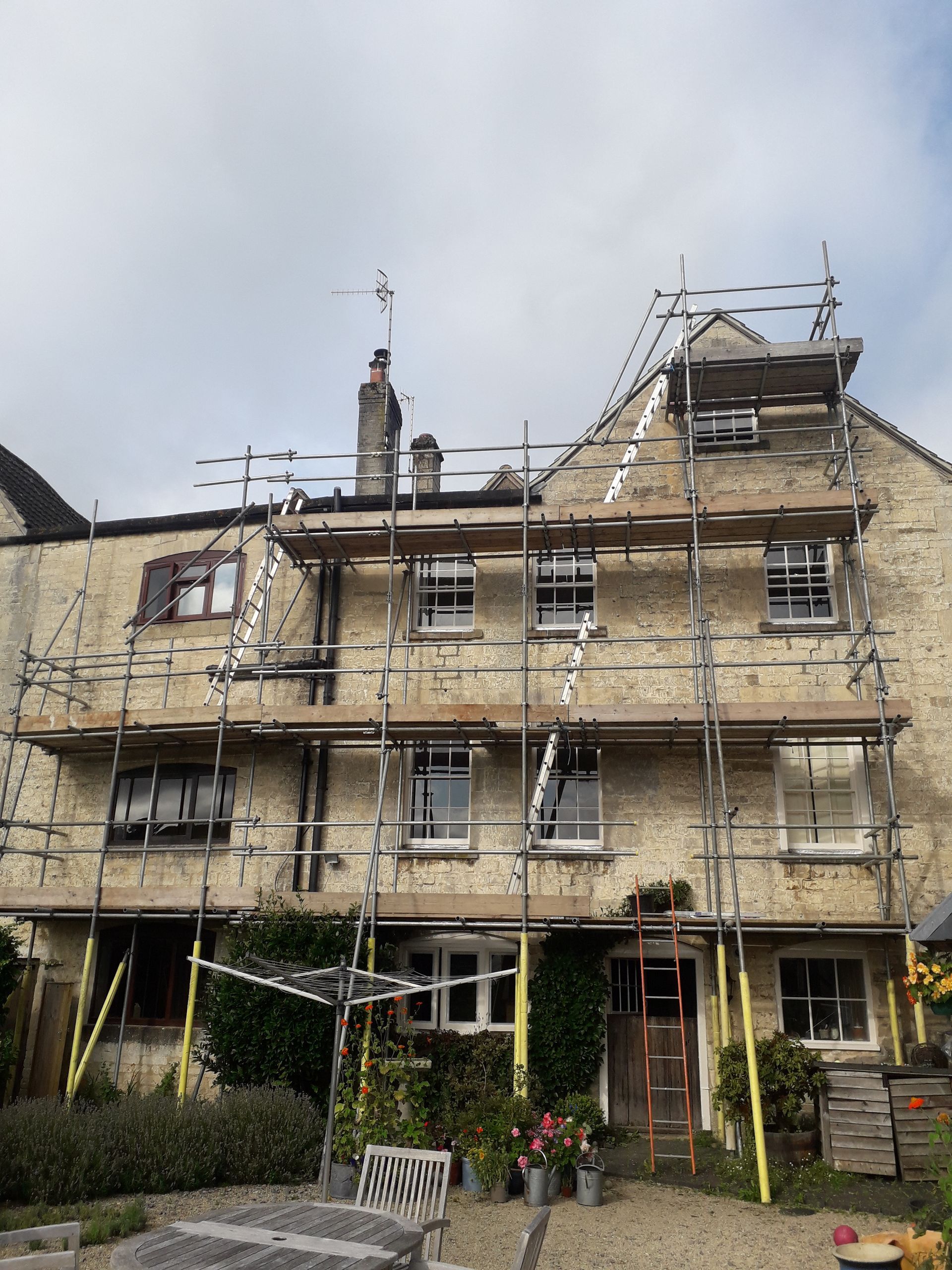 A large building with scaffolding on the side of it