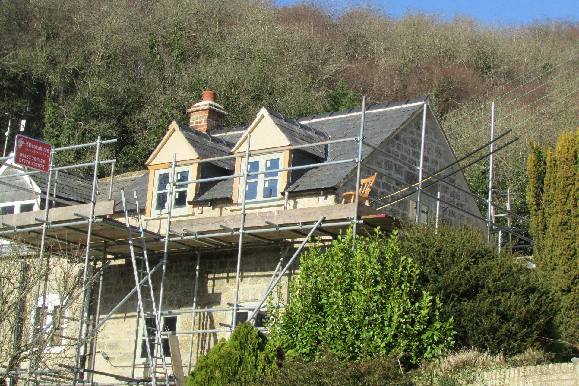 Cotswold stone roofing being repaired by Westshire Roofing in Stroud
