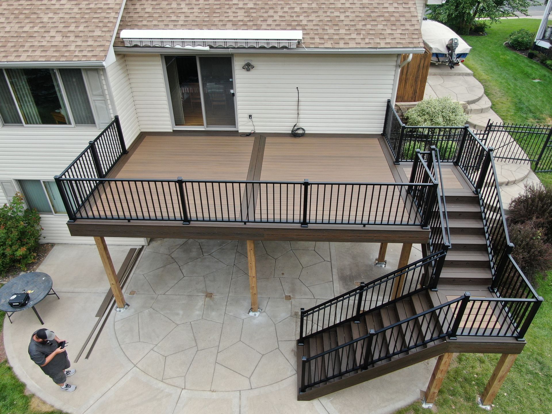 An aerial view of a deck with stairs leading up to it
