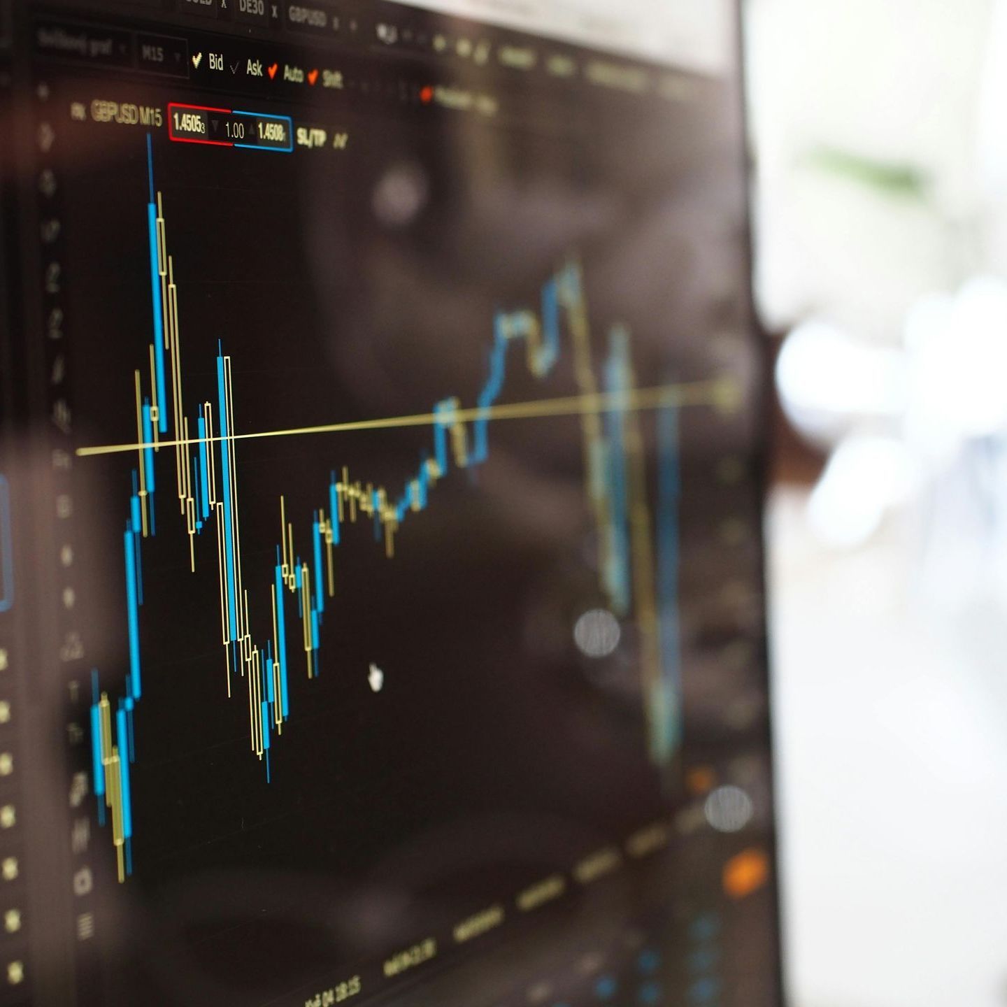 A close up of a computer screen with a graph on it. For Fraser Corporate Finance.