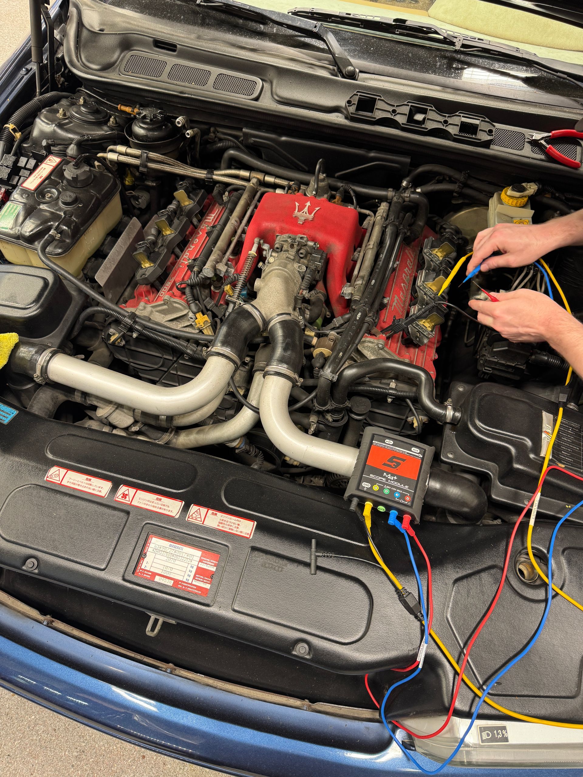 One of our mechanics doing a diagnostics test on a Ferrari