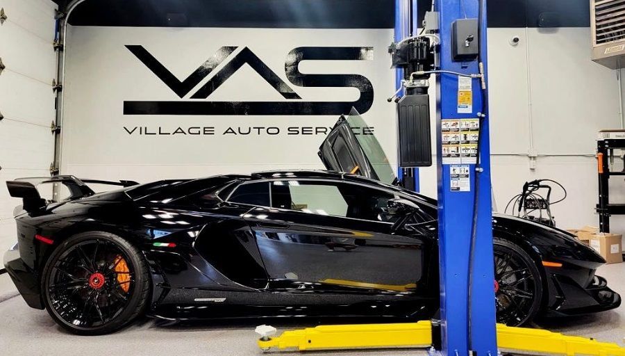 A black Lamborghini is parked in our Ancaster auto repair shop for service