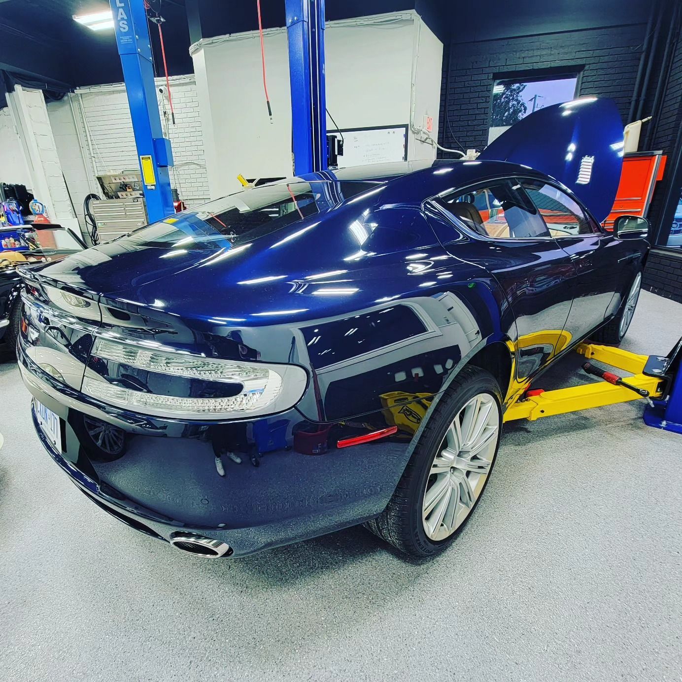 Aston Martin car in at the Ancaster shop to get checked by a mechanic