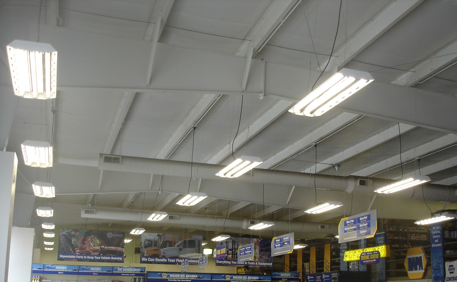 A store with a lot of lights on the ceiling