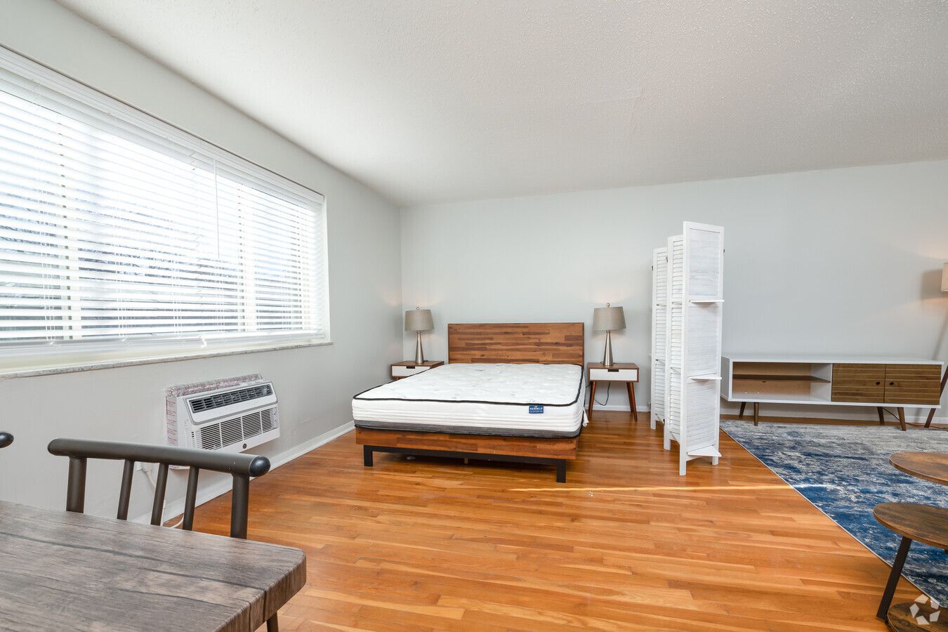 There is a large bed in the middle of the room.