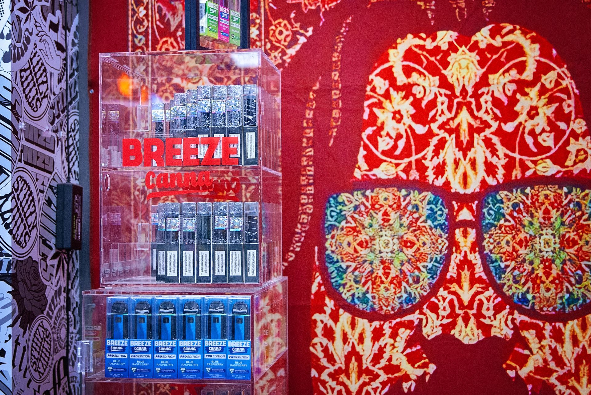 A breeze machine is sitting on a red rug