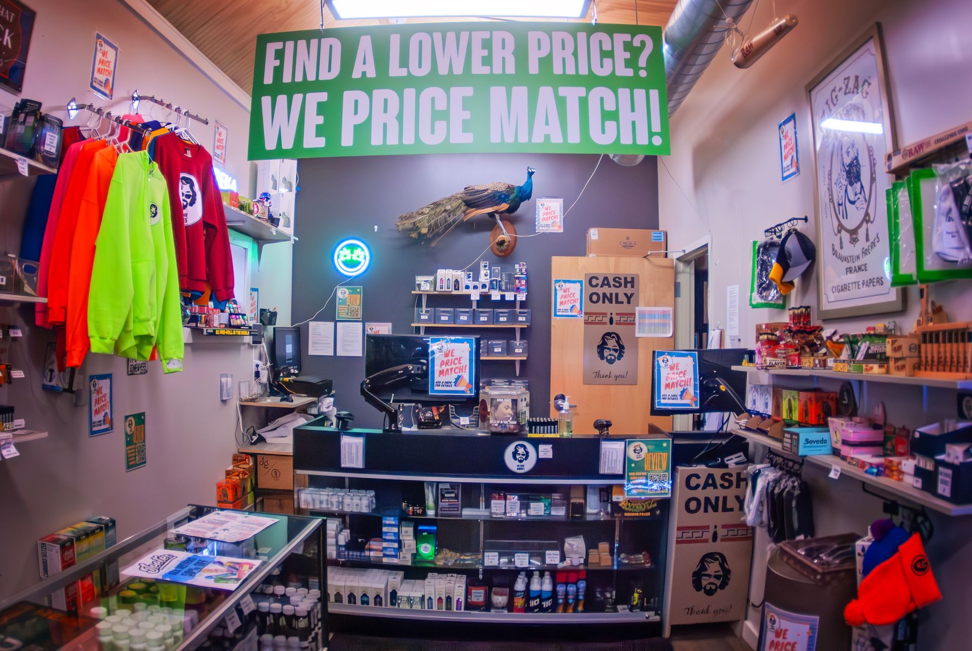 A store with a sign that says `` find a lower price ? we price match ! ''