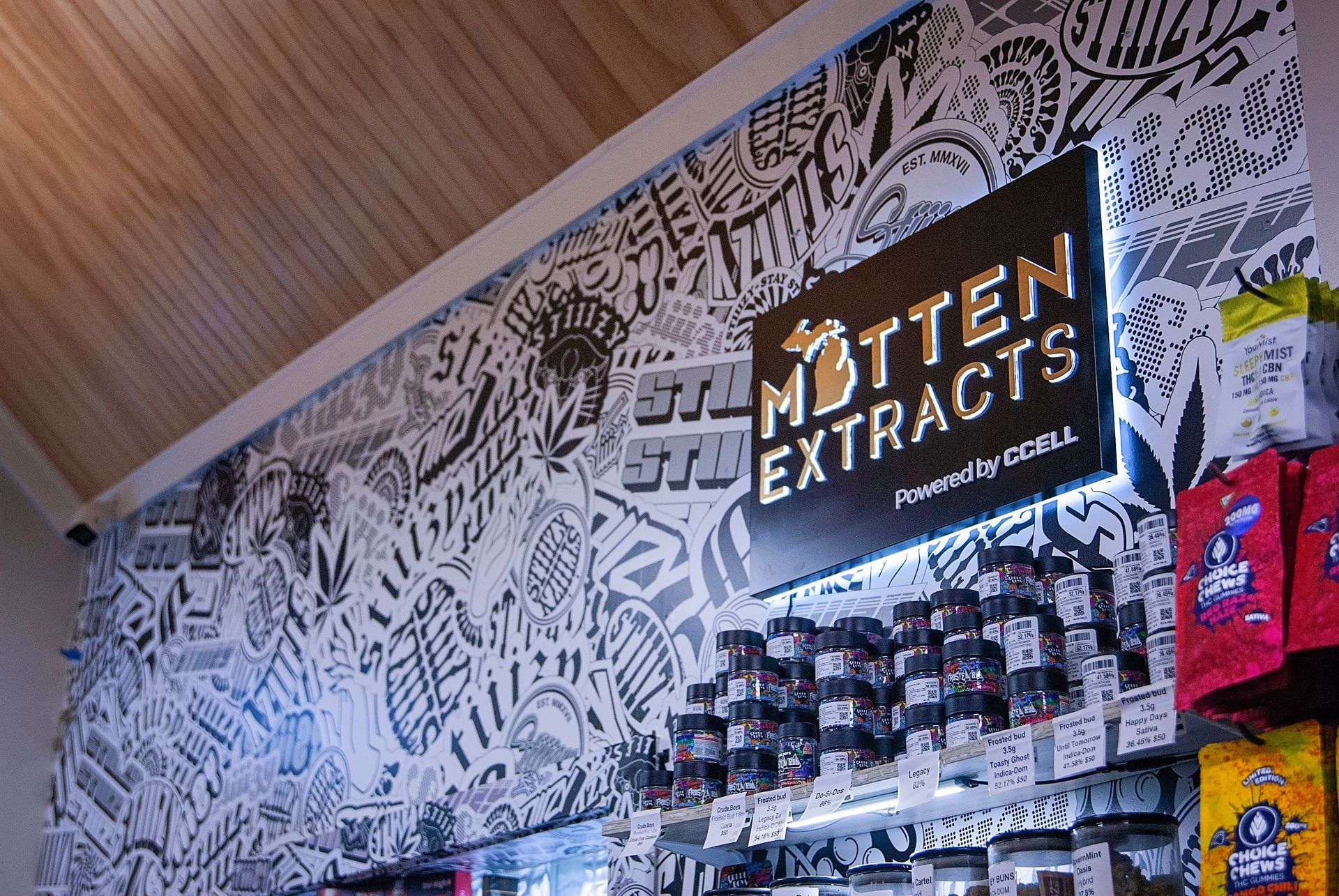 A store with a sign that says ' mdten extracts ' on it.