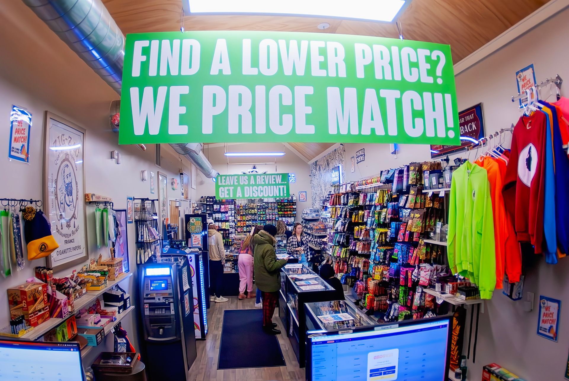 A store with a sign that says find a lower price we price match