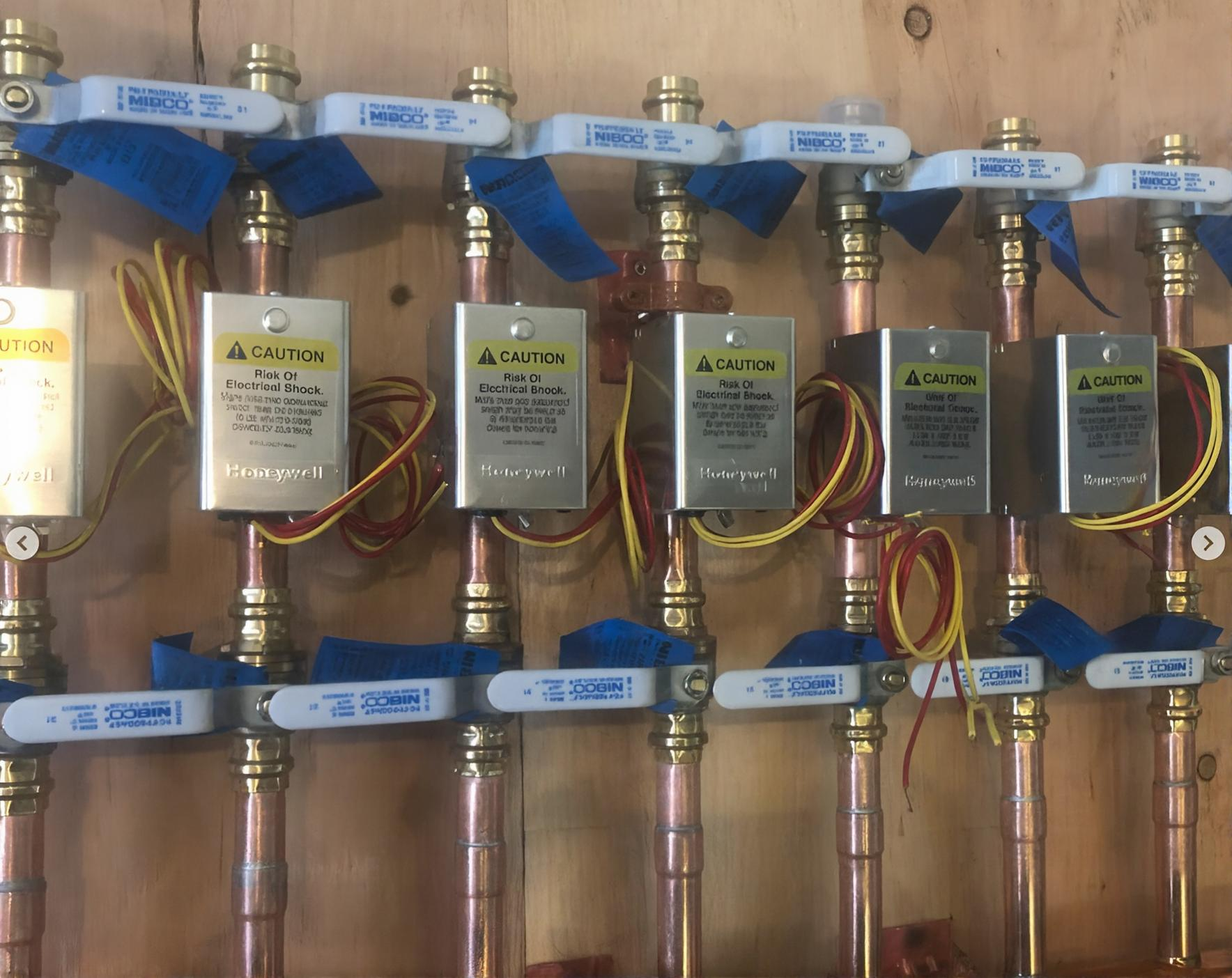 Radiant flooring system mounted on a wood wall installed by Steen & Son Plumbing and Heating in Mays Landing, New Jersey