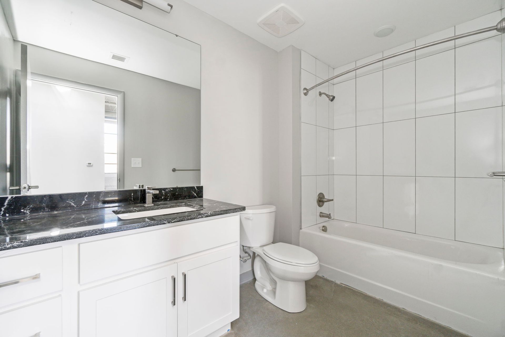 bathroom toilet and shower and sink