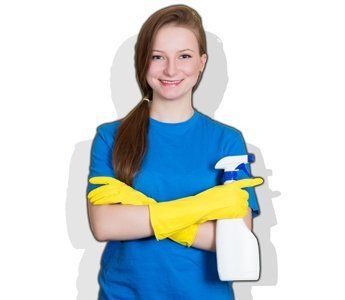 Woman Holding Spray — Chico, CA — Sanitorial Janitorial Service