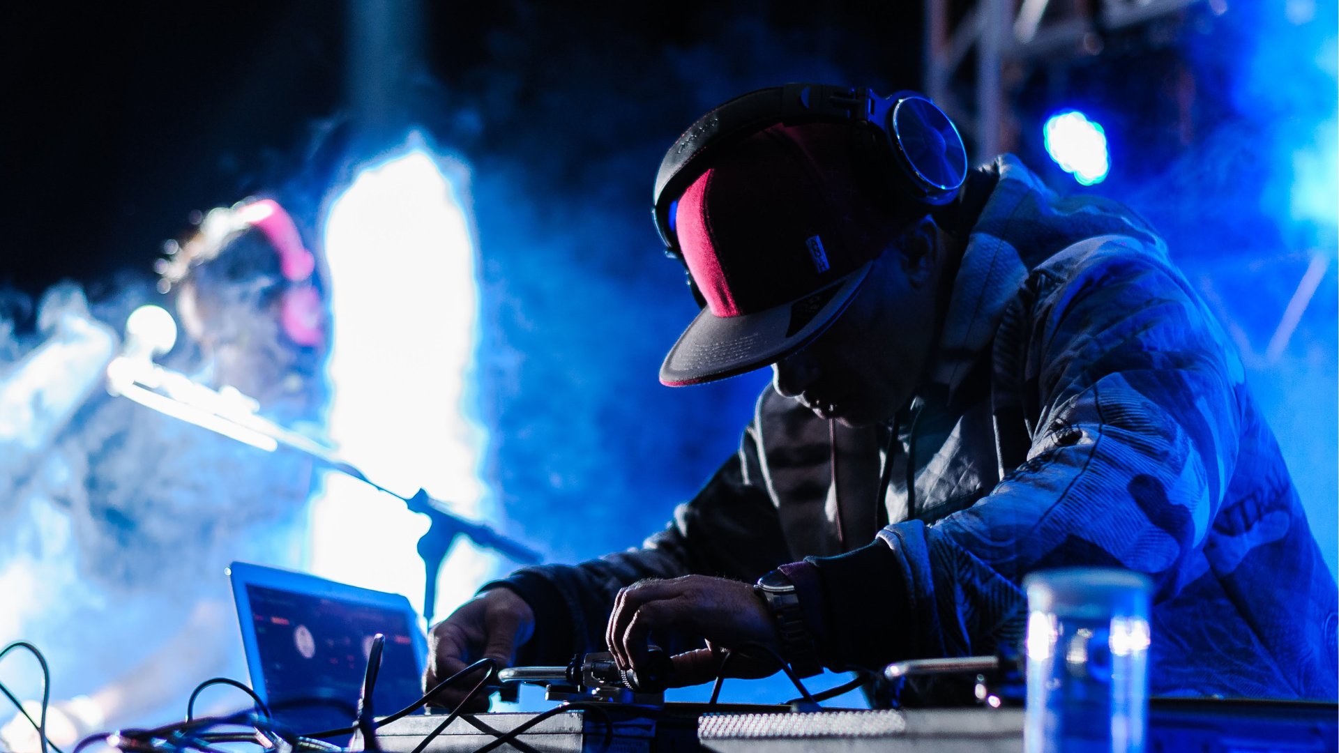 A bride and groom are dancing with their wedding party at their wedding reception.