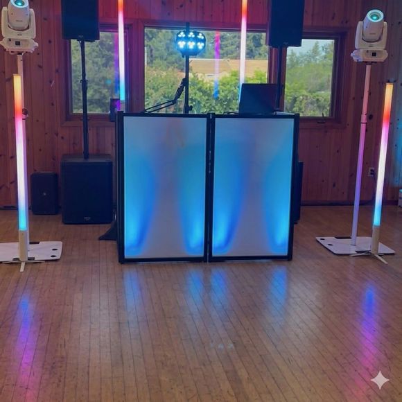 A bride and groom are dancing their first dance at their wedding reception.
