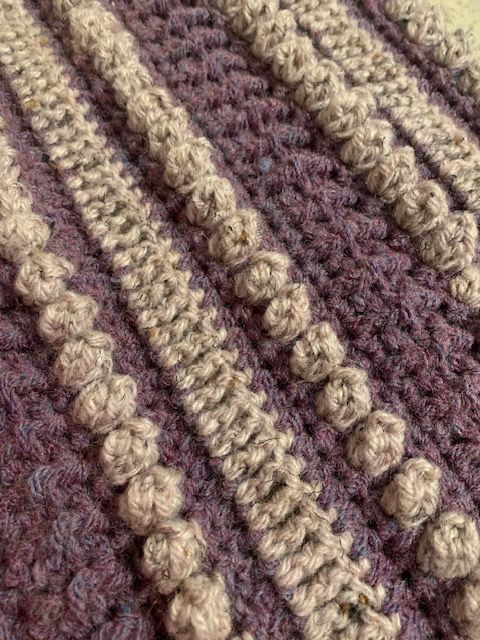 Crochet popcorn stitch blanket close up