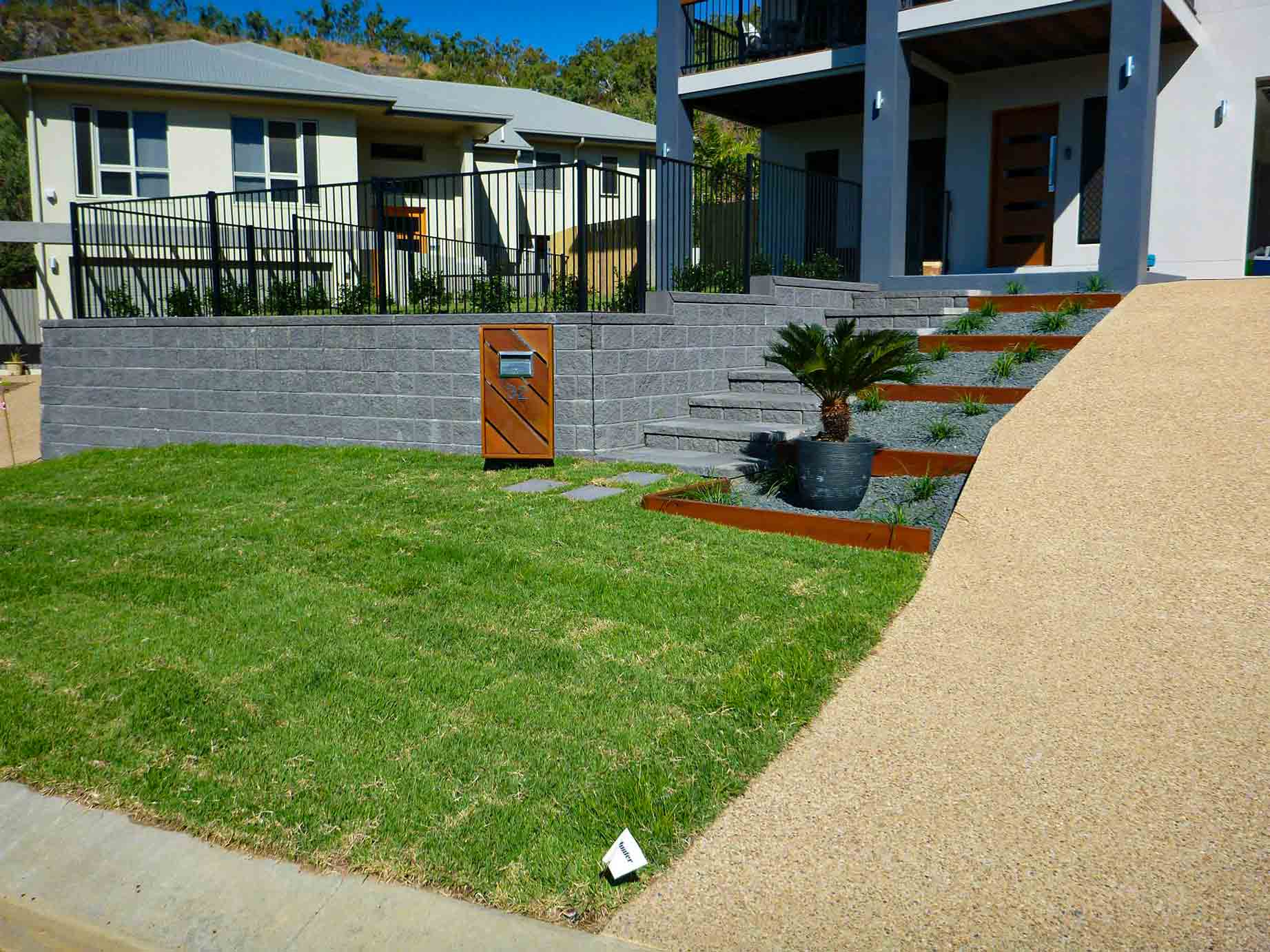 Landscaped Front Lawn — Lynams Landscapes Pty Ltd in Jensen, QLD