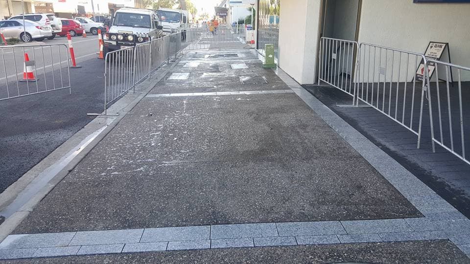 A Sidewalk With a Fence Along the Side of It — Lynams Landscapes Pty Ltd in Jensen, QLD