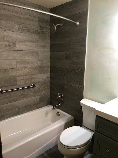 Bathtub with Curtain Rack — Greensburg, PA — Ruggiero Kitchen, Bath & Flooring Design Studio