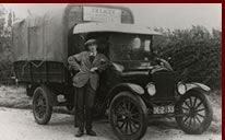 An old black and white photograph of Laceys removals original owner