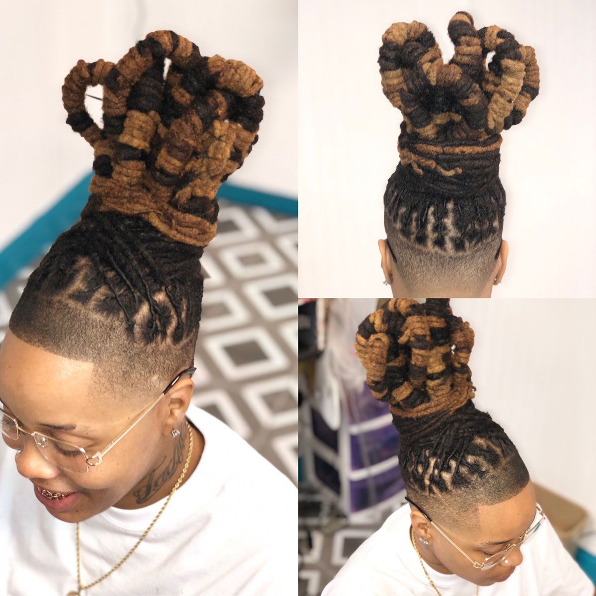 A woman with dreadlocks is wearing glasses and a white shirt