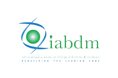 Logo of the International Academy of Biological Dentistry & Medicine: a green and blue eye design with text.