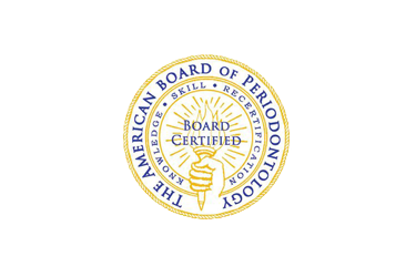 The American Board of Periodontology seal. Gold and blue colors with text and a torch symbol, signifying board certification.