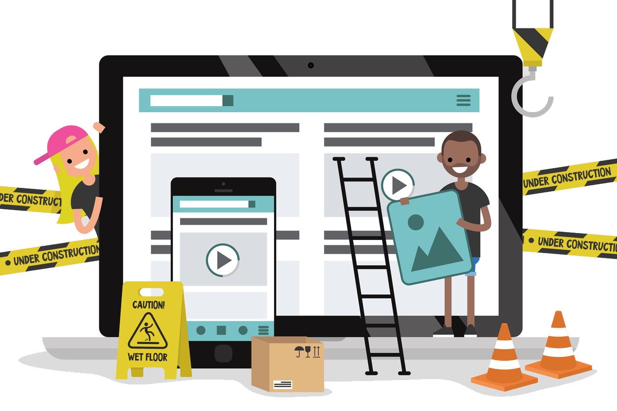 A man is holding a picture in front of a computer screen.