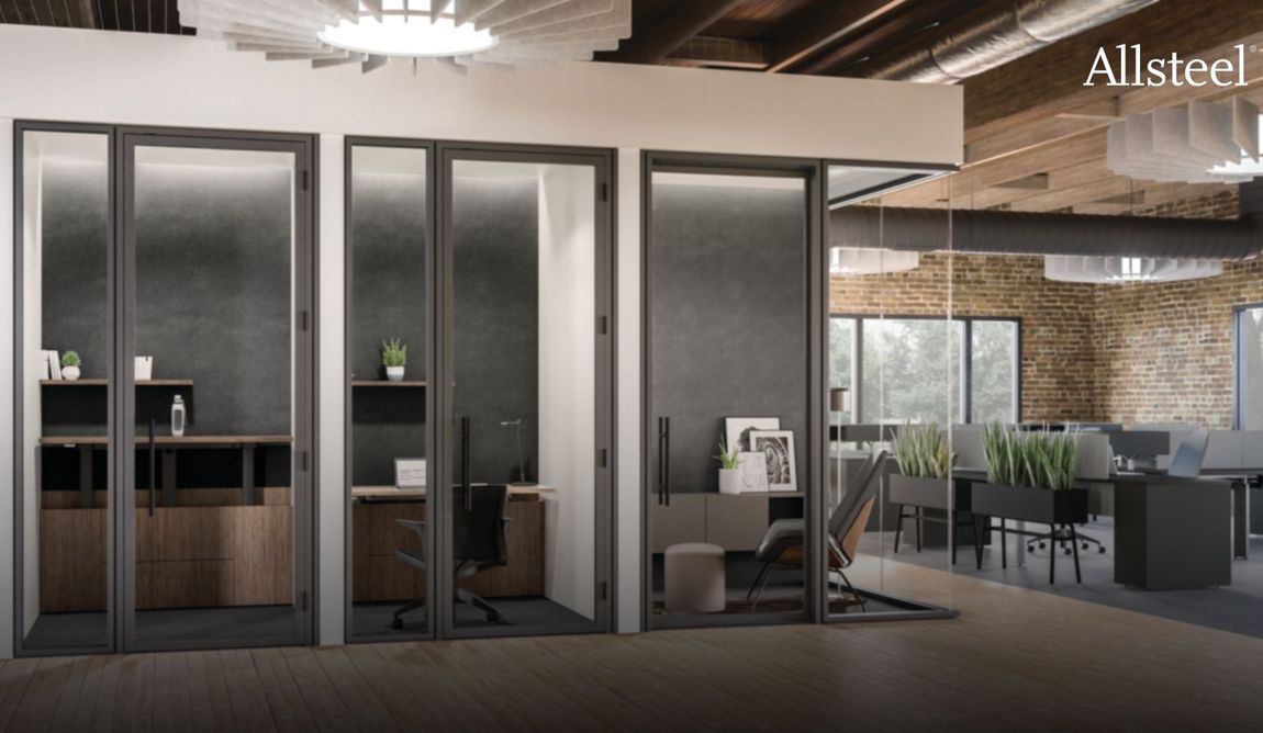 An artist 's impression of an office with cubicles and a brick wall.