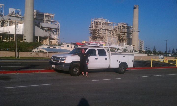 service car in the road — electrical repairs in Huntington Beach, CA