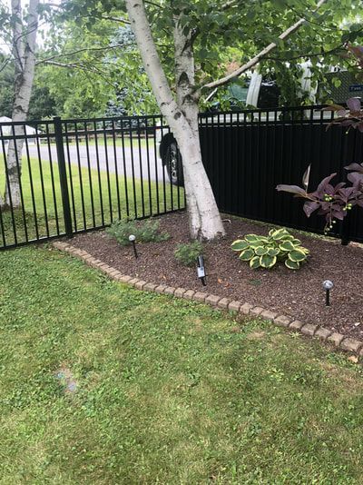 A Yard With a Black Fence – Pittsfield, MA - New England Fence