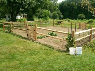 A Wooden Fence Surrounds the Garden – Pittsfield, MA - New England Fence