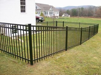 A Black Metal Fence in Front of a House – Pittsfield, MA - New England Fence