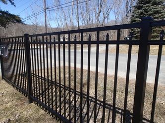 Metal Fence Next to a Road – Pittsfield, MA - New England Fence