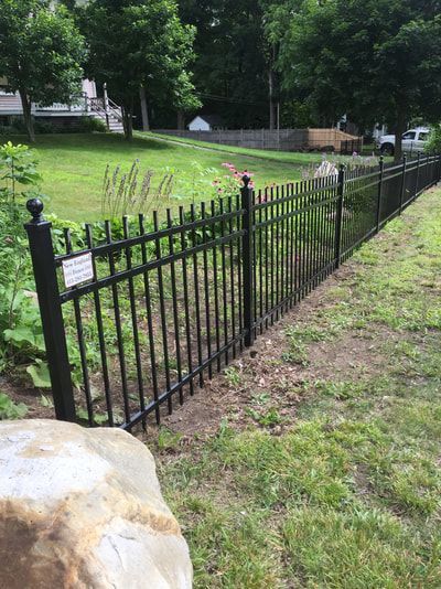 Metal Fence in a Yard – Pittsfield, MA - New England Fence