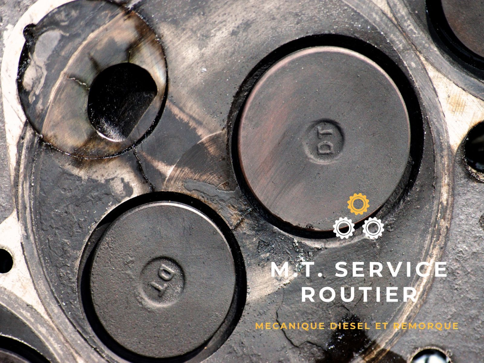 A close up of a metal object with the words m.t. service routier on the bottom