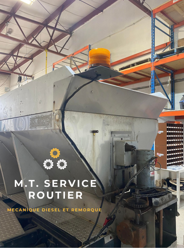 A machine in a warehouse that says m.t. service routier