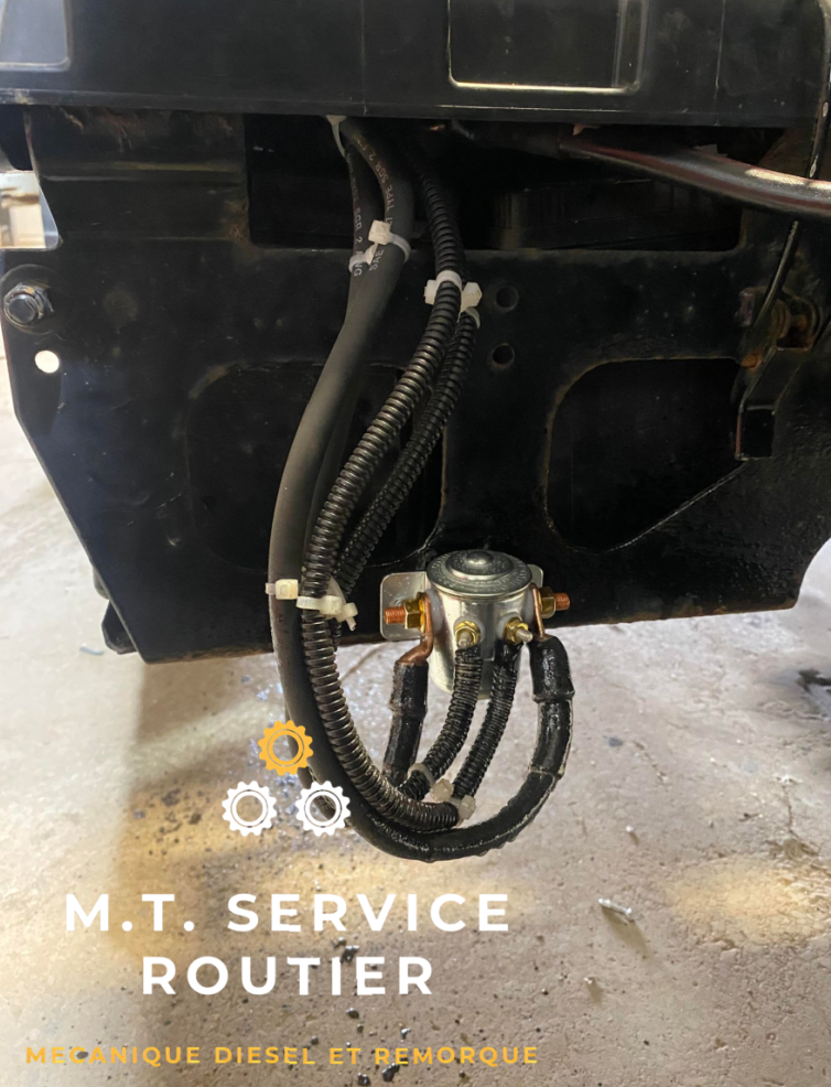 A picture of a hose attached to a vehicle says m.t. service routier