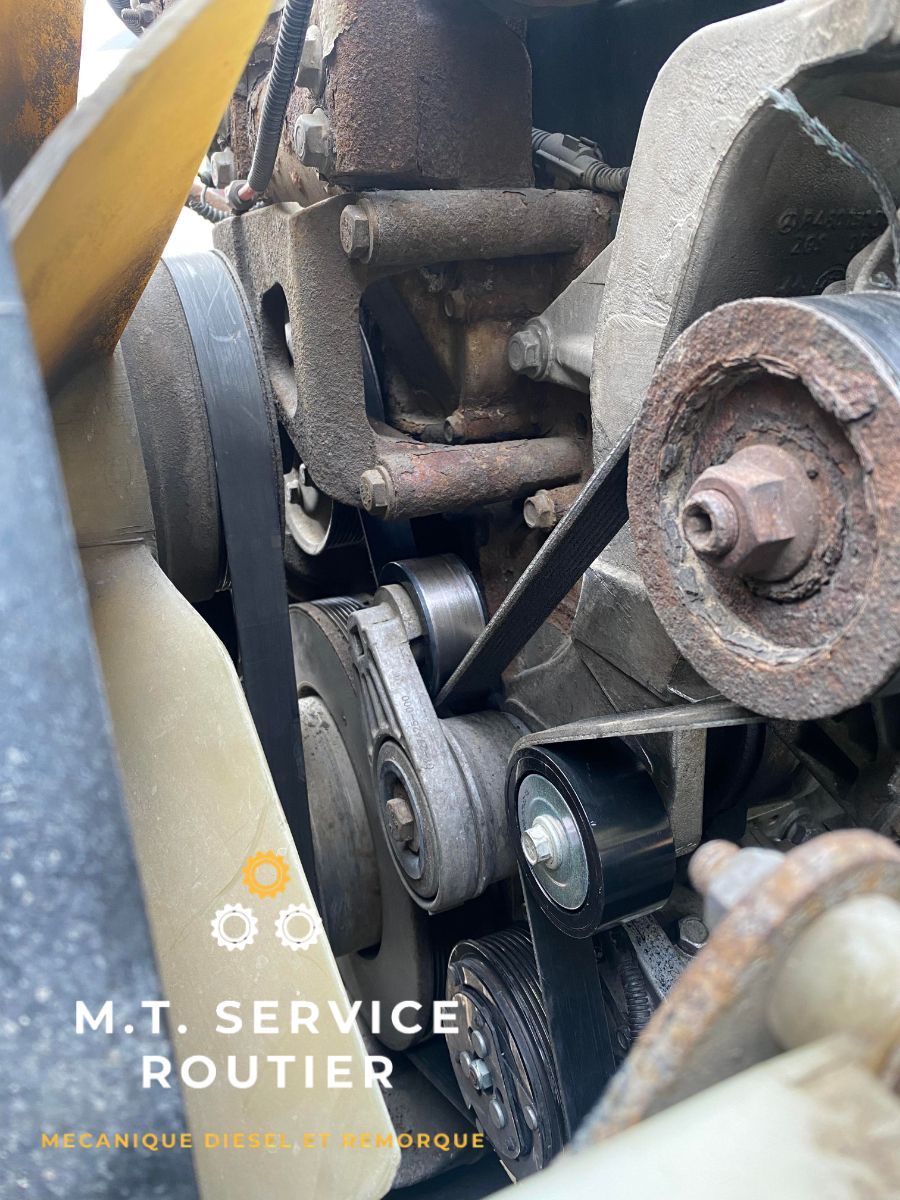 A close up of a belt on a car engine