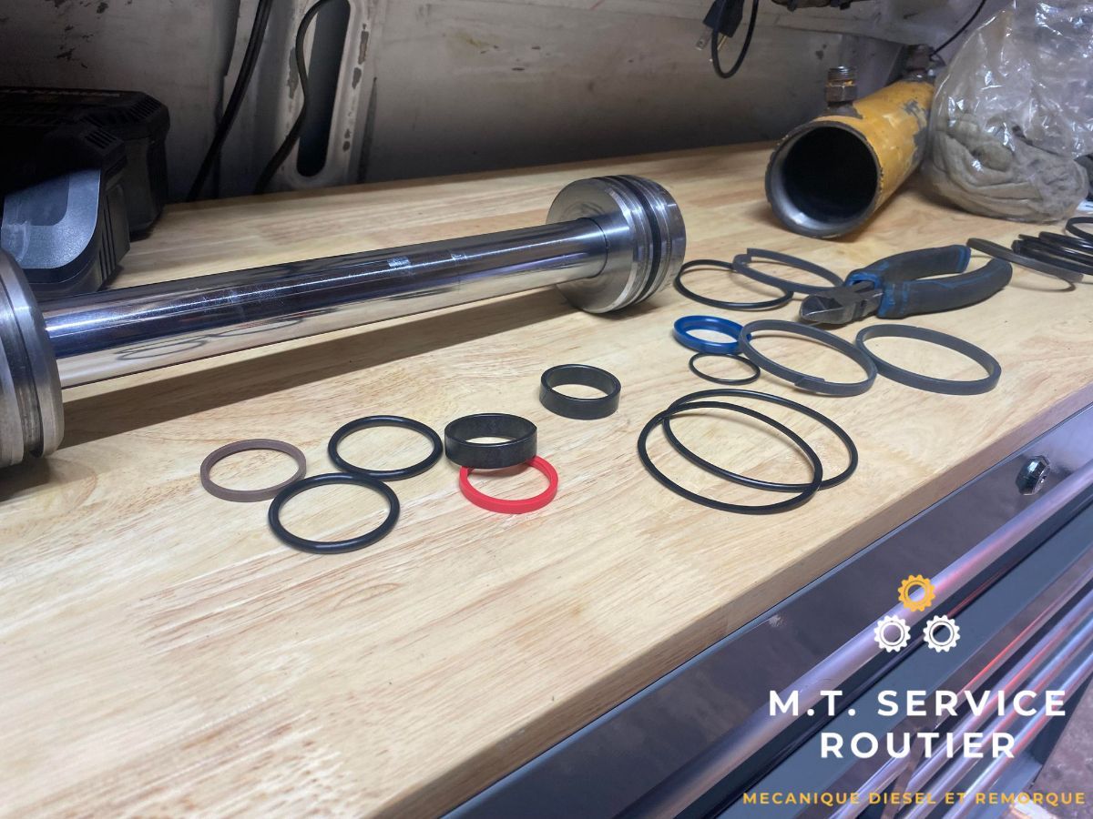 A wooden table with a bunch of rubber rings on it