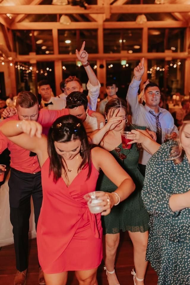 Mix It Up! providing dj services to an event where a group of people are dancing