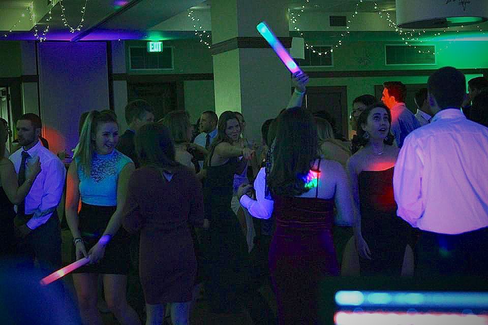 Mix It Up! providing dj services to a wedding where a group of people are dancing