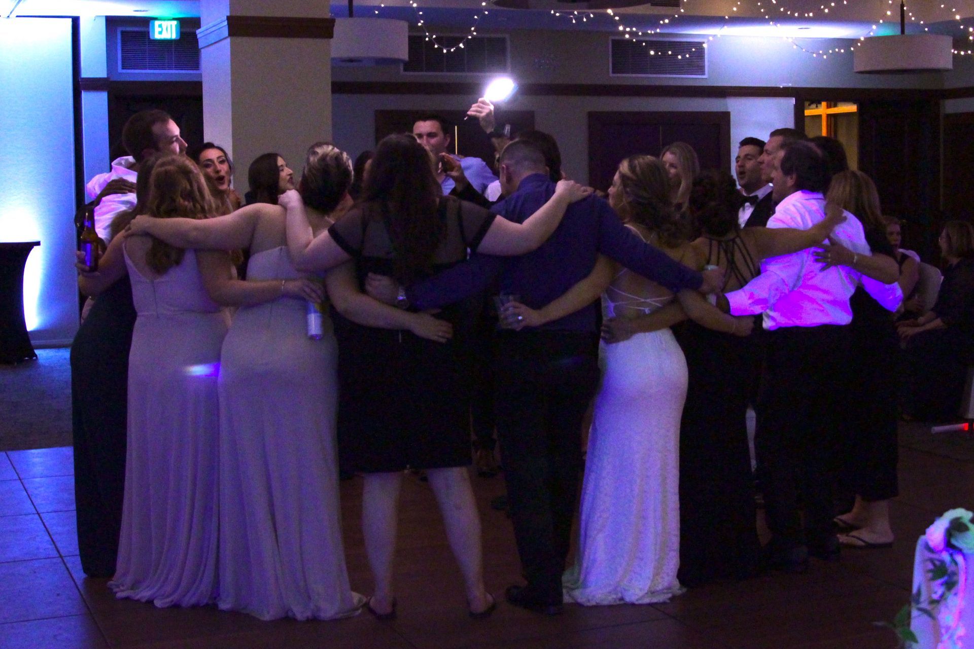 Mix It Up! providing dj services to a wedding where a group of people are dancing