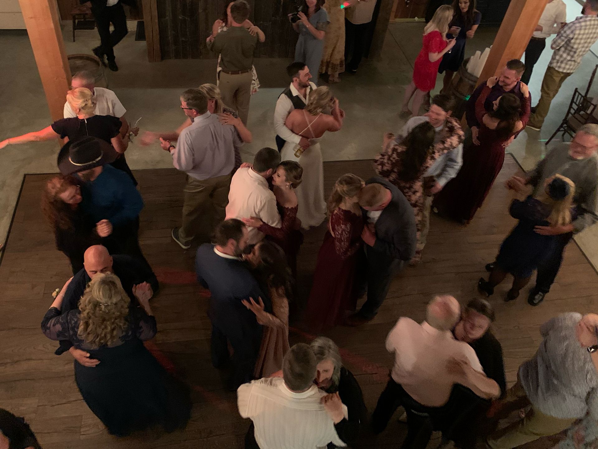 Mix It Up! providing dj services to a wedding with an arial photo of a large group of people dancing