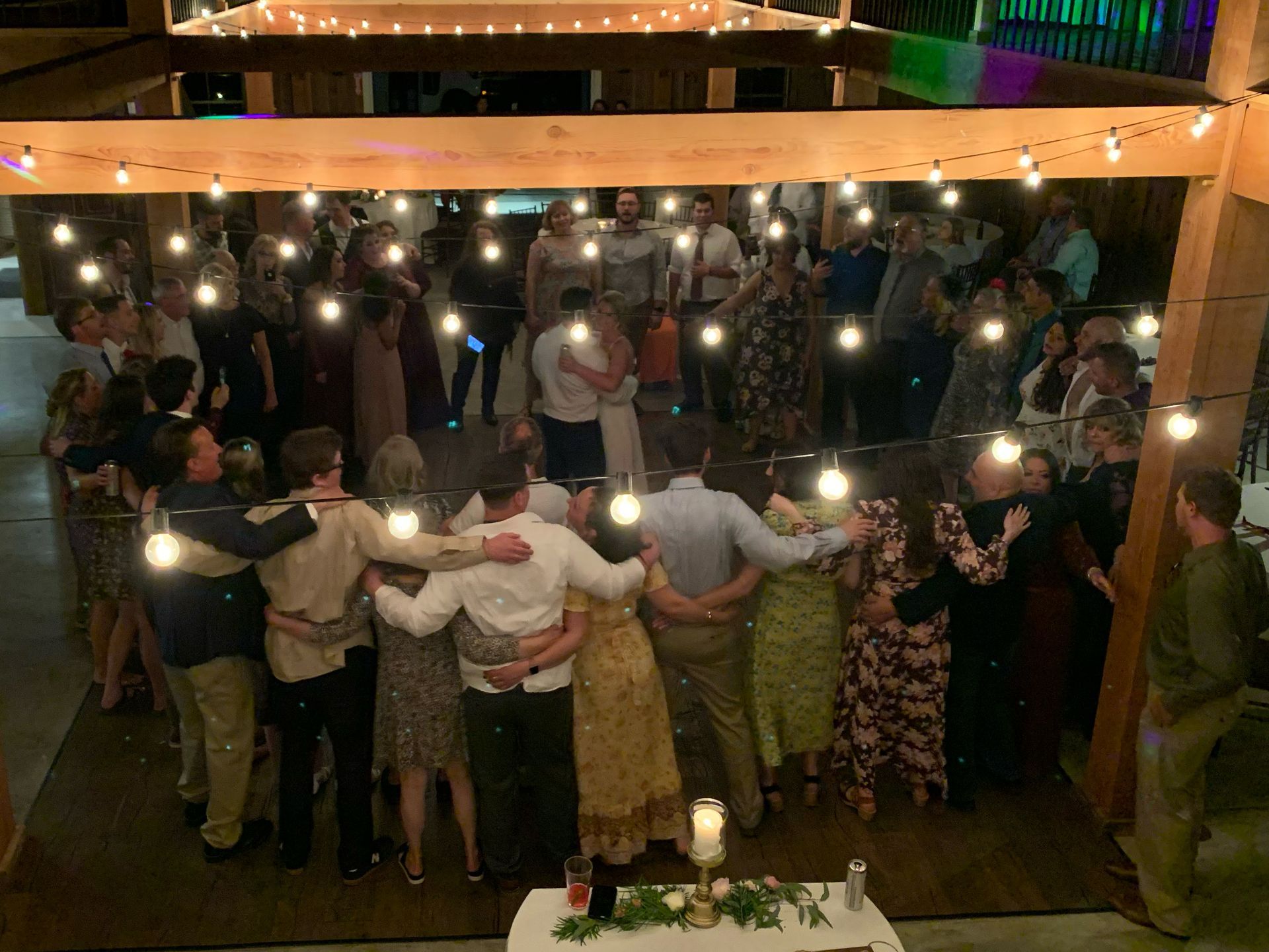 Mix It Up! providing dj services to a wedding where a large group of people are dancing